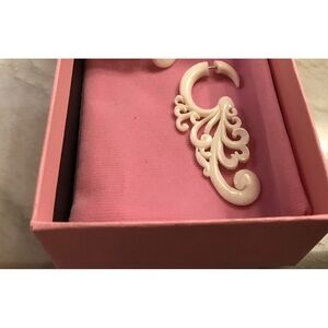 Earrings white resin ( I believe)